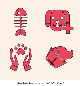 Set Veterinary clinic symbol, Fish skeleton, Veterinary clinic symbol and Hands with animals footprint icon. Vector