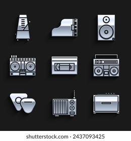 Set VHS video cassette tape, Radio with antenna, Guitar amplifier, Home stereo two speakers, pick, DJ remote for playing and mixing music, Stereo and Metronome pendulum motion icon. Vector