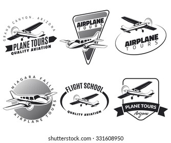 Set of vintage airplane emblems, badges and icons.Airplane tours, flight school and plane design elements. Isolated lite airplane side view.