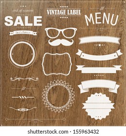 Set Of Vintage Badges With Wood Background