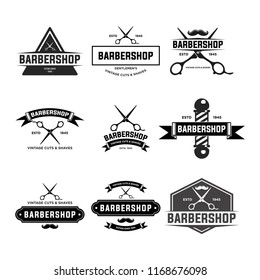 Set of vintage barber shop badges and emblems . EPS 10