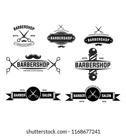 Set of vintage barber shop badges and emblems . EPS 10