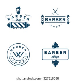 Set of vintage barber shop badges and emblems isolated on white background