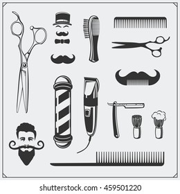 Set of vintage Barber shop design elements and badges.