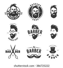 Set of vintage barber shop emblems, labels, badges and design elements. Monochrome male faces. Vintage vector illustration.