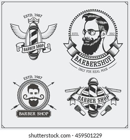 Set of vintage Barber shop labels, badges, emblems and design elements.