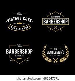 Set of vintage barber shop labels, badges and design elements