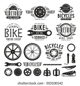 Set of vintage bike shop badges and labels. Isolated on white background