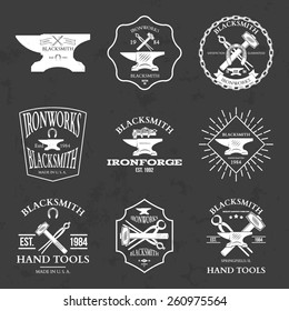 Set of vintage blacksmith labels and design elements vector illustration