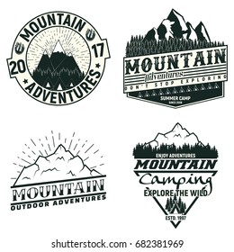 Set of Vintage camping or tourism logo designs,  grange print stamps, creative typography emblems, Vector