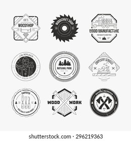 Set of vintage carpentry logotypes made in vector. Wood work and manufacture label templates. Detailed emblems with timber industry elements and carpentry tools. 