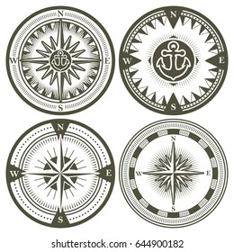 Set of vintage compasses with a wind rose and anchors