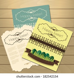 Set of vintage Easter cards on the wooden background