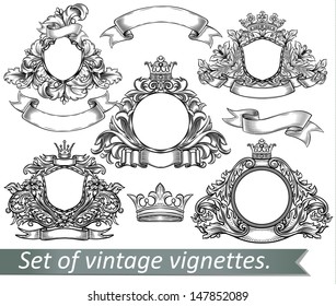Set of vintage emblem with crowns and ribbons.