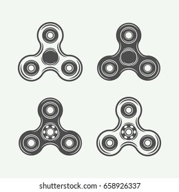 Set of vintage fidget spinners logos, emblems, badges and motivational posters. Monochrome Graphic Art. Vector Illustration.