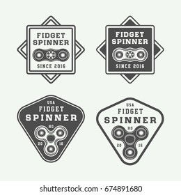 Set of vintage fidget spinners logos, emblems, badges and motivational posters. Monochrome Graphic Art. Vector Illustration.

