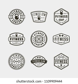 set of vintage fitness gym logos. retro styled sport emblems, badges, design elements, logotype templates. vector illustration