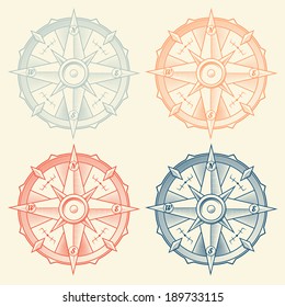 Set of vintage graphic compasses isolated on light background. Vector Illustration.