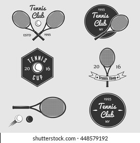 Set of Vintage Graphics and Emblems for web design or print.Tennis club,cup style professional logo design.Monochrome Tenis Sport elements,symbols.Racket,ball.  Vector hipster insignia eps10.