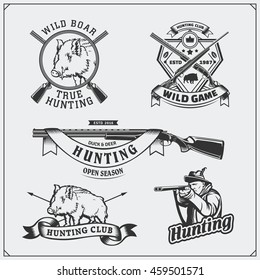 Set of vintage hunting wild boar labels, badges, emblems and design elements.