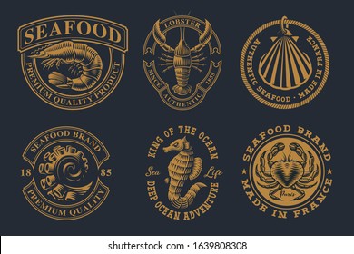Set of vintage illustrations for seafood theme. Perfect for logos, badges, labels and many other uses. Text is on the separate group.