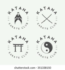 Set of vintage karate or martial arts logo, emblem, badge, label and design elements in retro style. Vector illustration