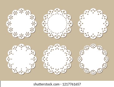 Set of vintage lace doilies, decorative place mats, paper cutout designs