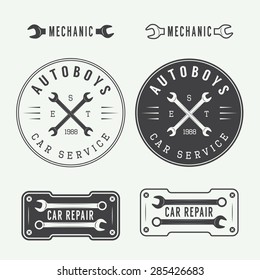 Set of vintage mechanic labels, emblems and logo. Vector illustration