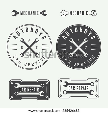 Set of vintage mechanic labels, emblems and logo. Vector illustration