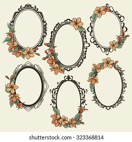 set of vintage oval frames decorated with flowers and leaves