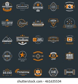 Set of vintage retro logotype templates. Collection of 25 items. Vector logo design elements. Icon symbols. Labels. Badges. White and orange colors on dark background