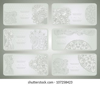 Set of vintage silver stylish floral-lace business cards. Paisley design