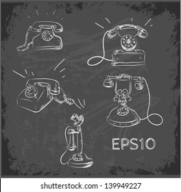 Set of vintage sketch phones on black chalkboard. Vector illustration