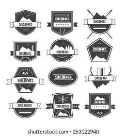 Set of vintage skiing labels, logos and design elements. Vector illustration