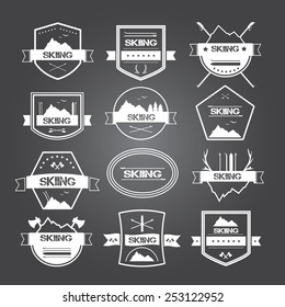 Set of vintage skiing labels, logos and design elements. Vector illustration