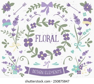 A set of vintage style floral design elements in violet and green. Hand drawn decorative elements and embellishments. Borders, laurels, swirls, wreaths and other floral graphics.