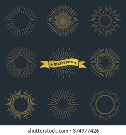 Set of vintage sunburst. Geometric shapes and light ray collection. Hipster style frames. Vector illustration of grunge design. Golden shapes isolated on dark background