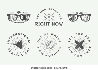 Set of vintage surfing logos, posters, prints, slogans in retro style. Vector Illustration