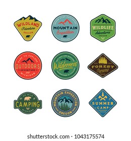 set of vintage wilderness logos. hand drawn retro styled outdoor adventure emblems, badges, design elements, logotype templates. vector illustration