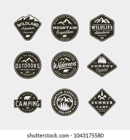 set of vintage wilderness logos. hand drawn retro styled outdoor adventure emblems, badges, design elements, logotype templates. vector illustration