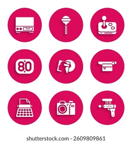 Set Vinyl disk, Photo camera, Ray gun, Waist bag of banana, Retro typewriter, 80s, Joystick and Old video cassette player icon. Vector