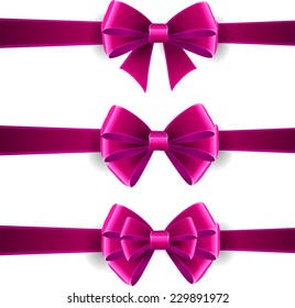 Set of violet bows isolated on white