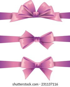 Set of violet bows isolated on white