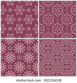 Set of violet seamless backgrounds with floral patterns for wallpapers, textile and fabrics