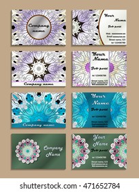 Set of visiting cards made in oriental vintage style with mandalas. Shiny designed business cards. Vector art