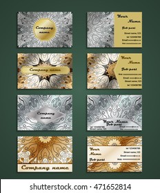 Set of visiting cards made in oriental vintage style. Shiny designed business cards. Vector art