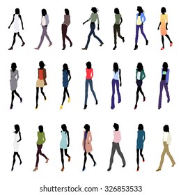 Set of walking female silhouettes in fashion clothes