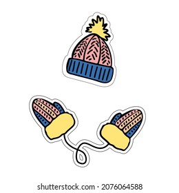 A set of warm accessories from a hat and mittens. Vector hand drawn image