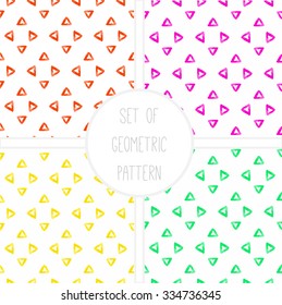 Set of Watercolor geometric triangles. Seamless pattern on the white background. Vector illustration.