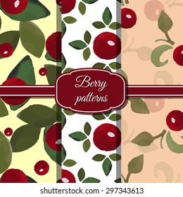 Set of watercolor seamless patterns made from red berries and green leafs.